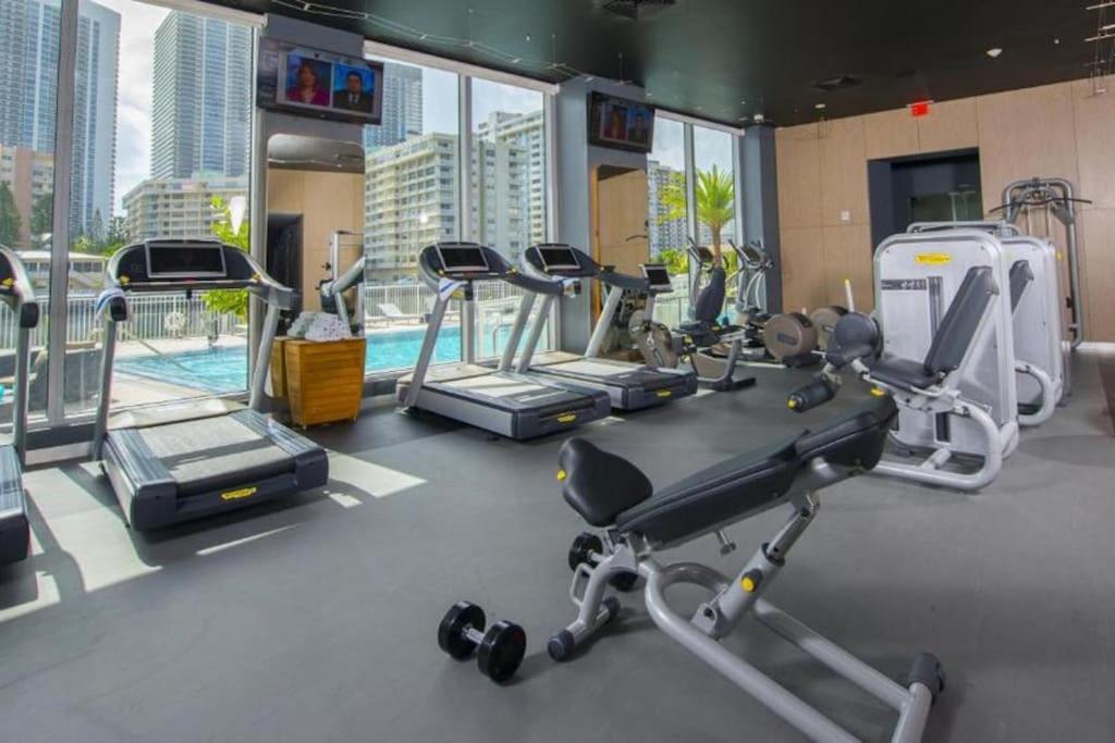 Waterfront Luxury Loft with Pool, Gym & Beach Chairs view 4
