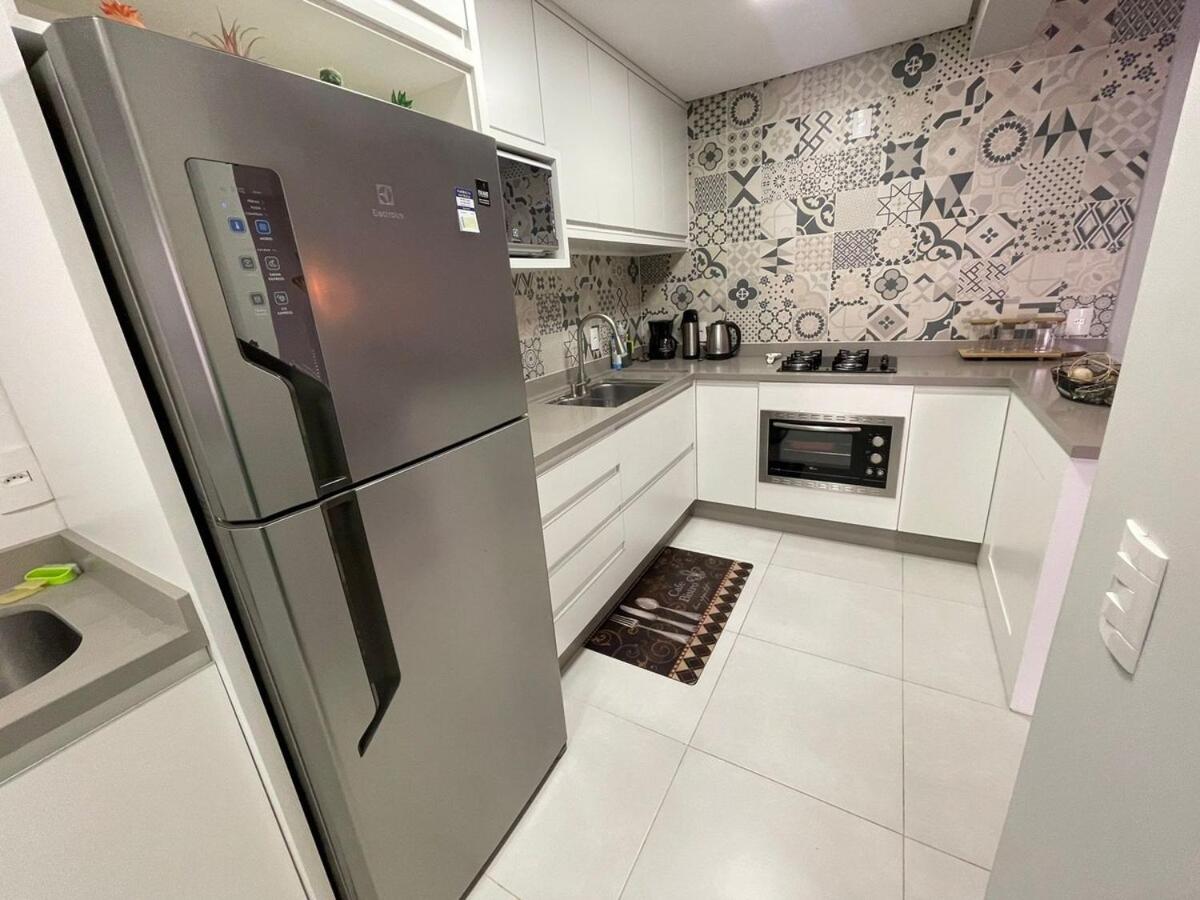 Cód 27 - Apartamento térreo com jacuzzi e área gourmet na Praia de Palmas