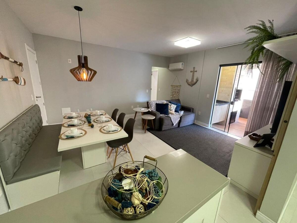 Cód 27 - Apartamento térreo com jacuzzi e área gourmet na Praia de Palmas
