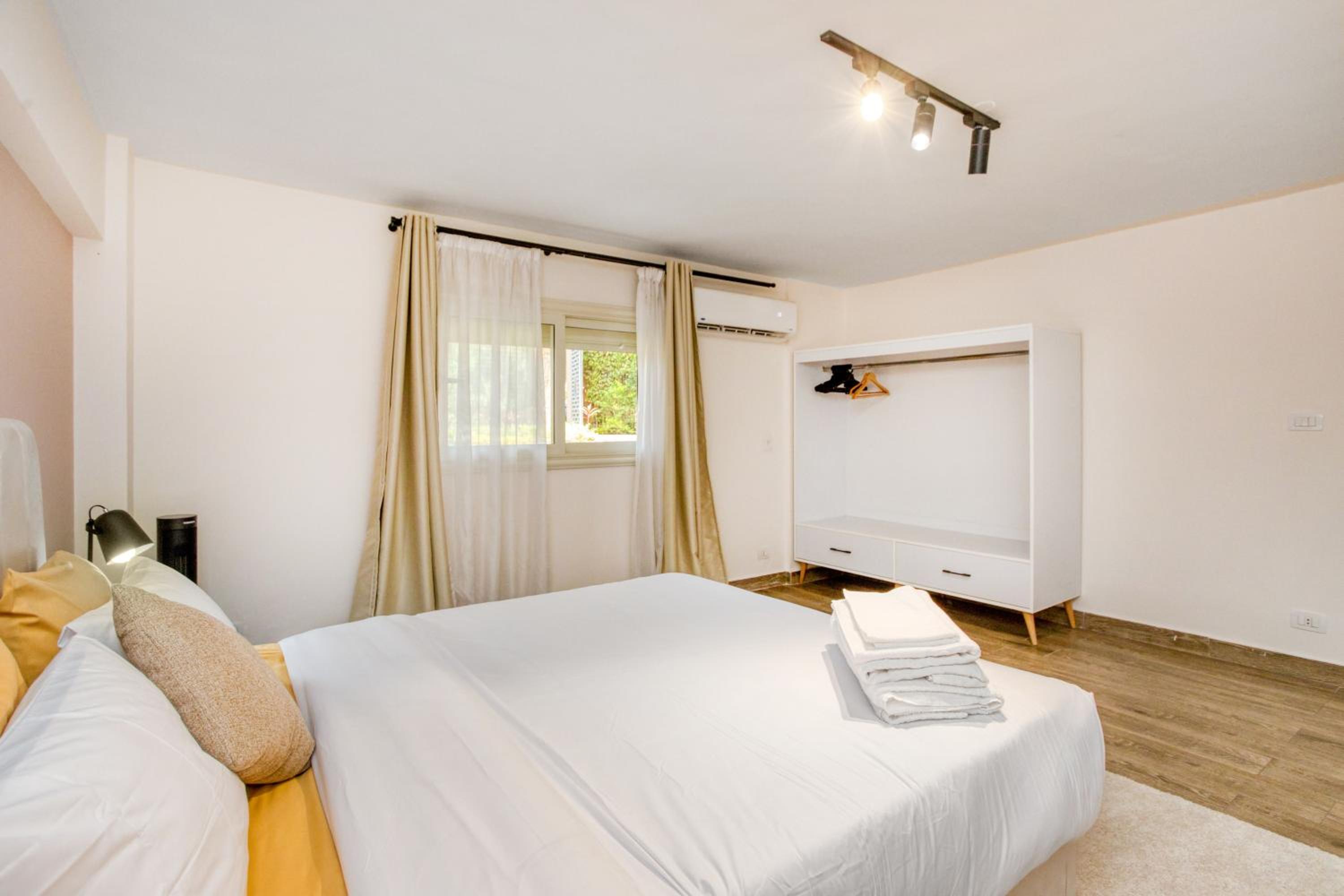 New cairo apartment in front of Garden 8 Mall