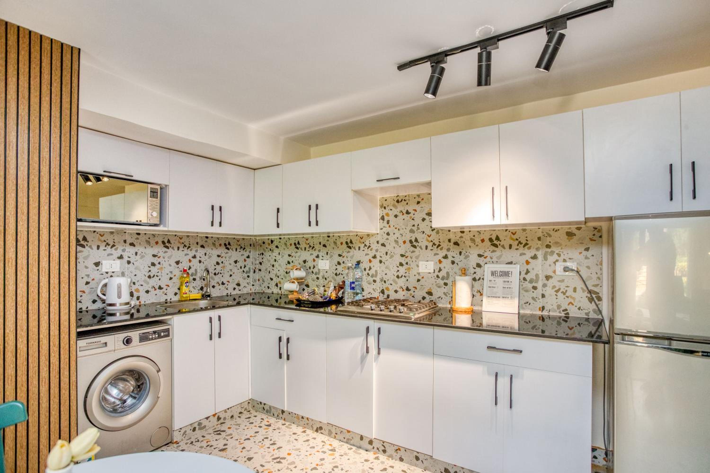 New cairo apartment in front of Garden 8 Mall