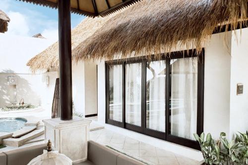 Hotel Villa de Malicott Athena Seminyak - Image 1