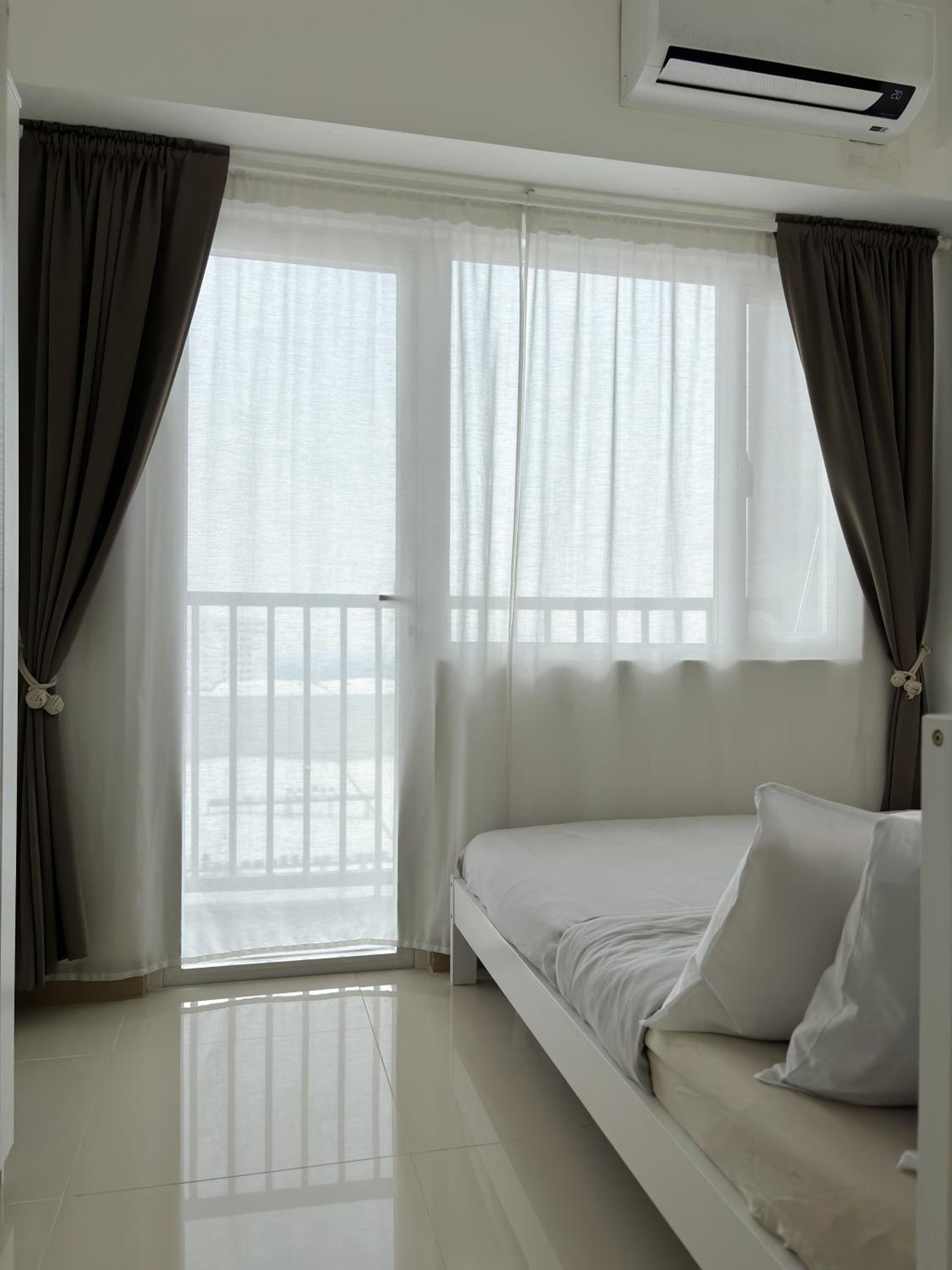 Cozy and Homey 1BR Condo at SMDC South Residences view 4