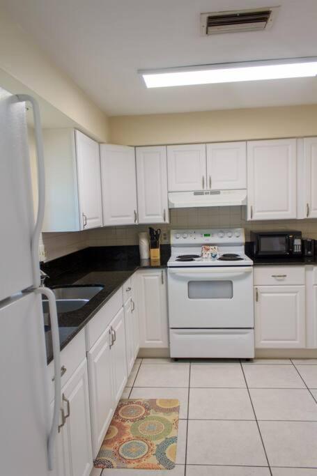 699 BEACH OASIS,WALK,BIKE TO BEACH, FENCED BACKYARD, Large Driveway view 5