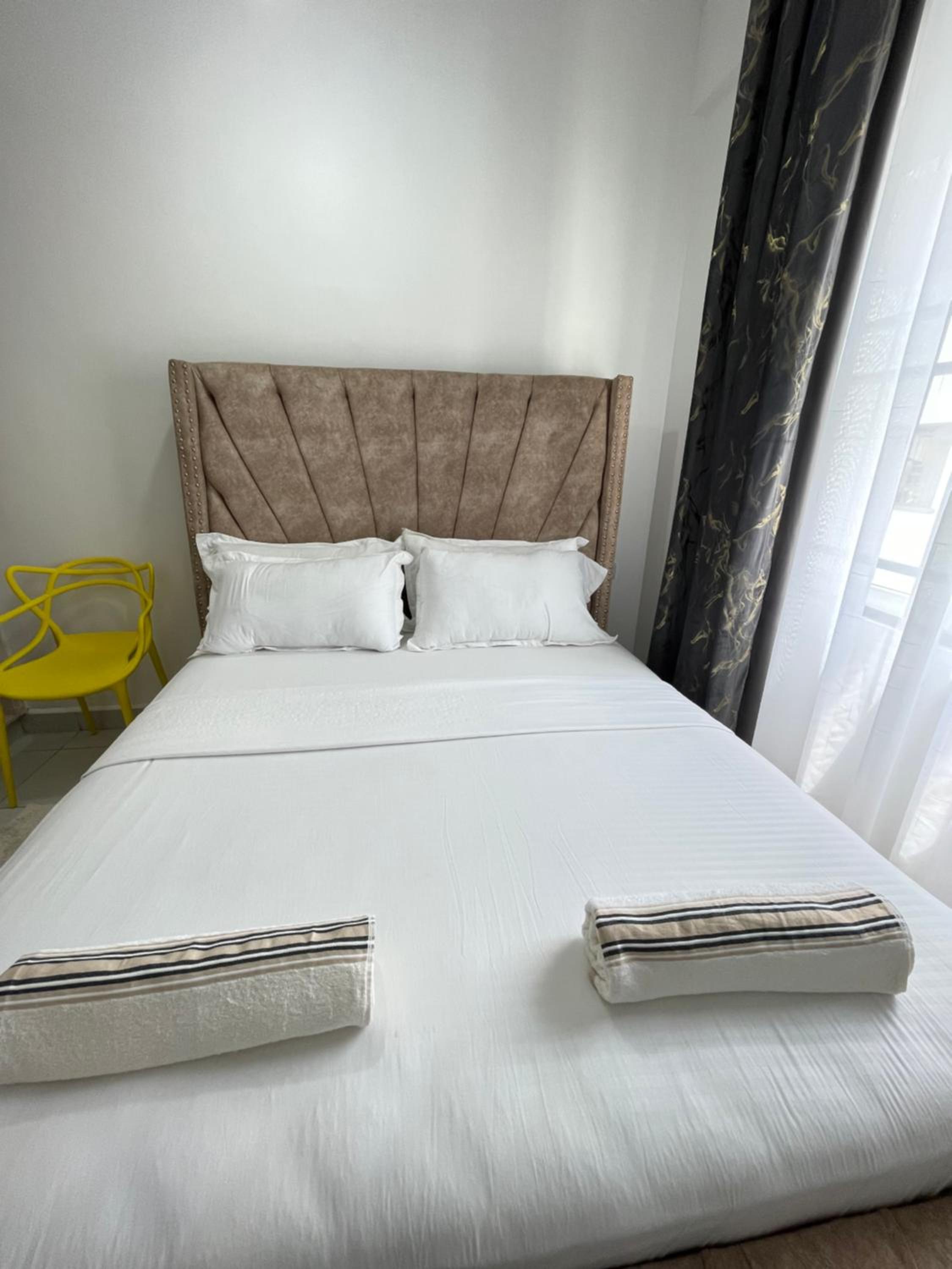 Two-Bedroom Apartment Near JKIA & SGR Free Parking & Wi-Fi By Irene view 3