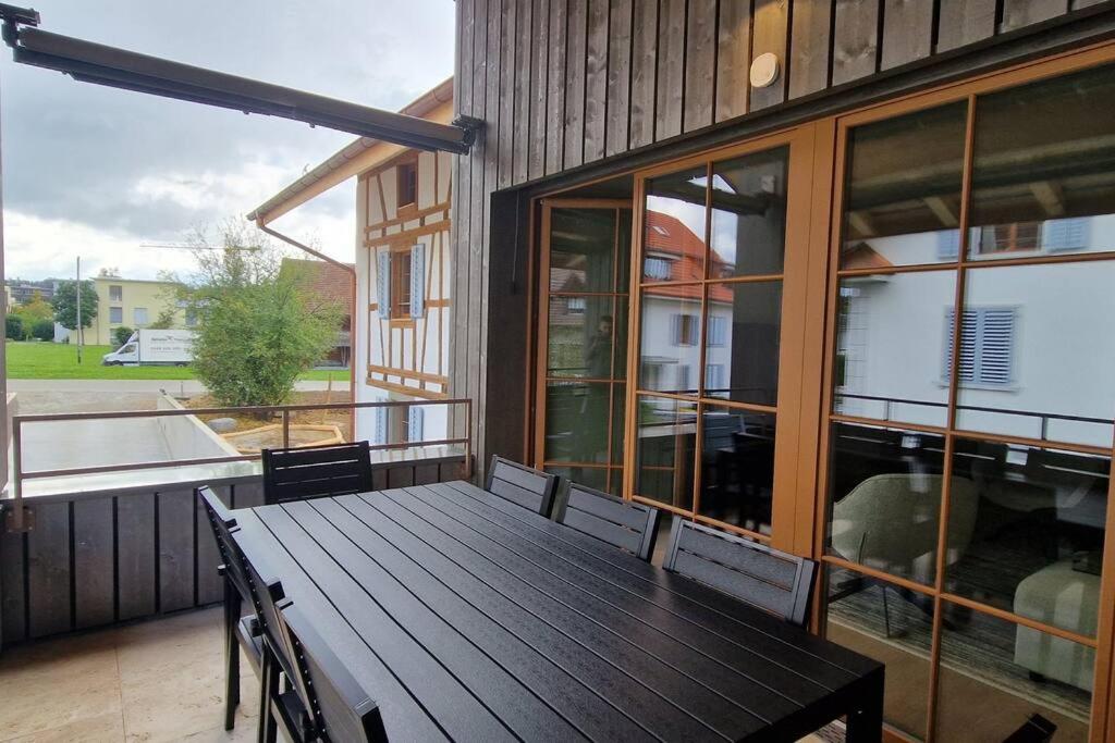 Visionary Hospitality Bassersdorf, Zürich - Premium Apartments in Swiss Style with Free Parking, Washer, Kitchen, Terrace, Vaulted Cellar Event Room, Bus S