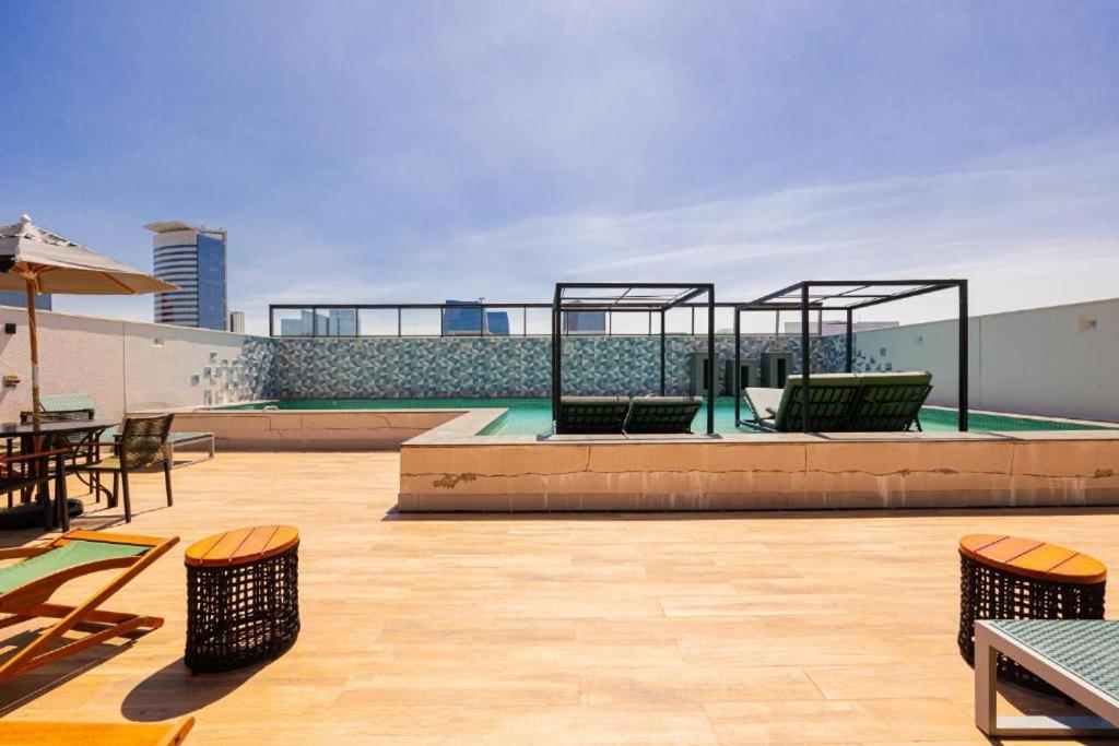 Vila Olímpia Studio Good Local Piscina Coworking Rooftop Cinema Gym CAMA QUEEN e SOFÁ CAMA QUEEN confortáveis e grandes