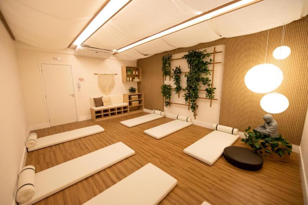 Vila Olímpia Studio Good Local Piscina Coworking Rooftop Cinema Gym CAMA QUEEN e SOFÁ CAMA QUEEN confortáveis e grandes