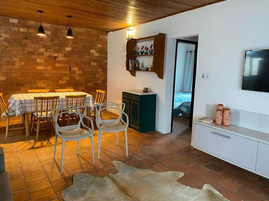 Casa com piscina a beira mar