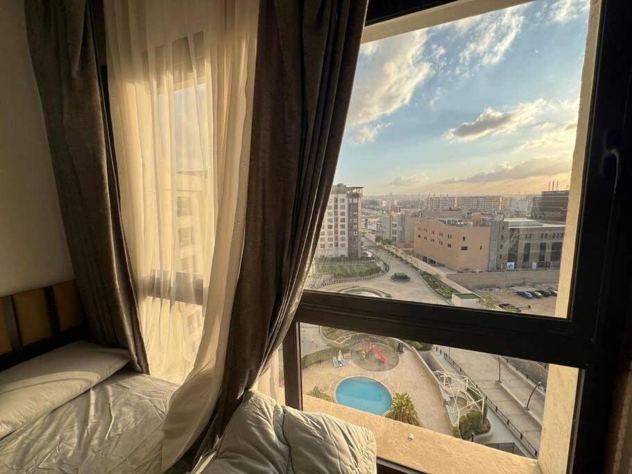 City View 2Brs Direct to the Pool - New Cairo
