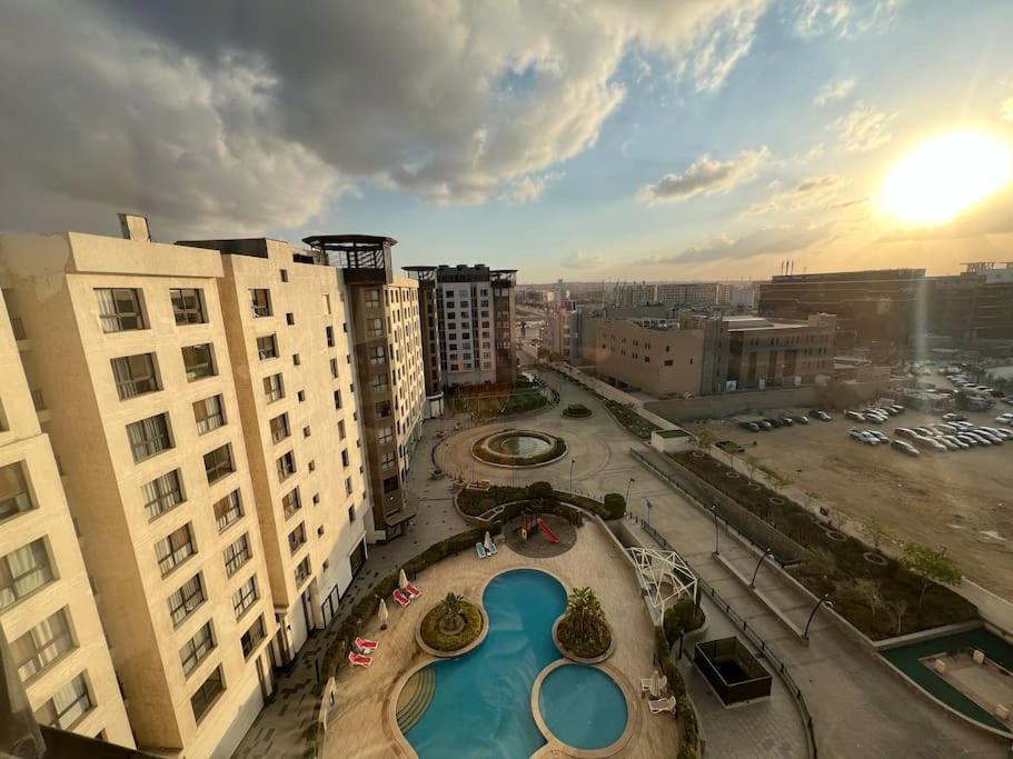 City View 2Brs Direct to the Pool - New Cairo