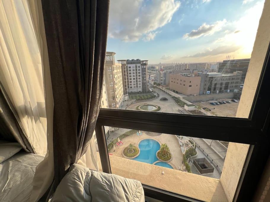 City View 2Brs Direct to the Pool - New Cairo