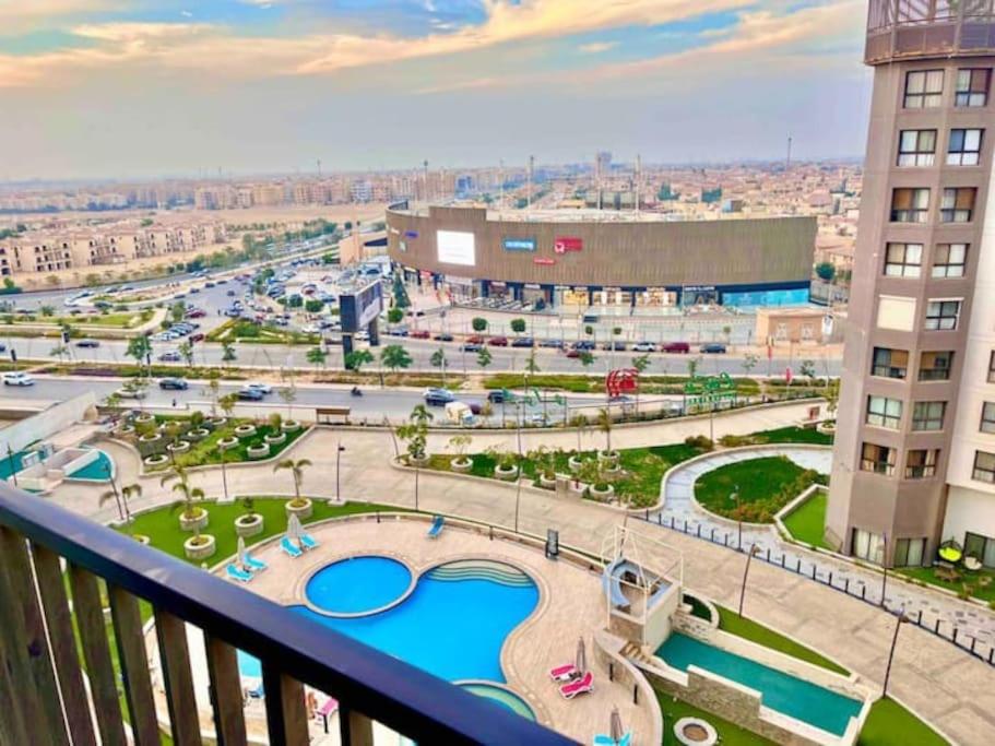 City View 2Brs Direct to the Pool - New Cairo