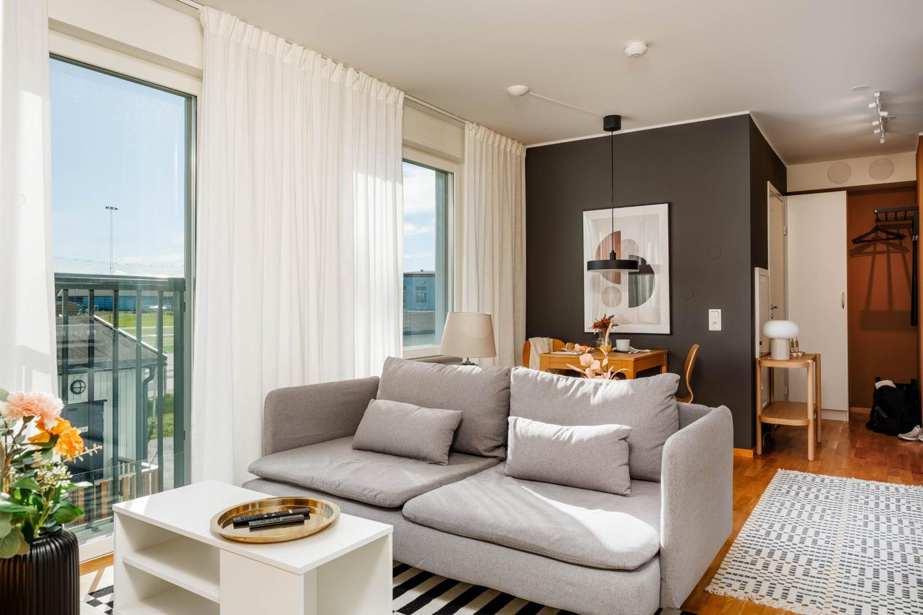 Guestly Homes - 1BR Nordic Comfort view 2