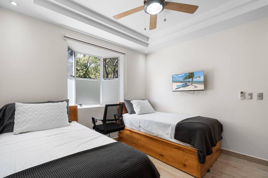 Gav3 2 bdrm new modern condo 15min walk to beach