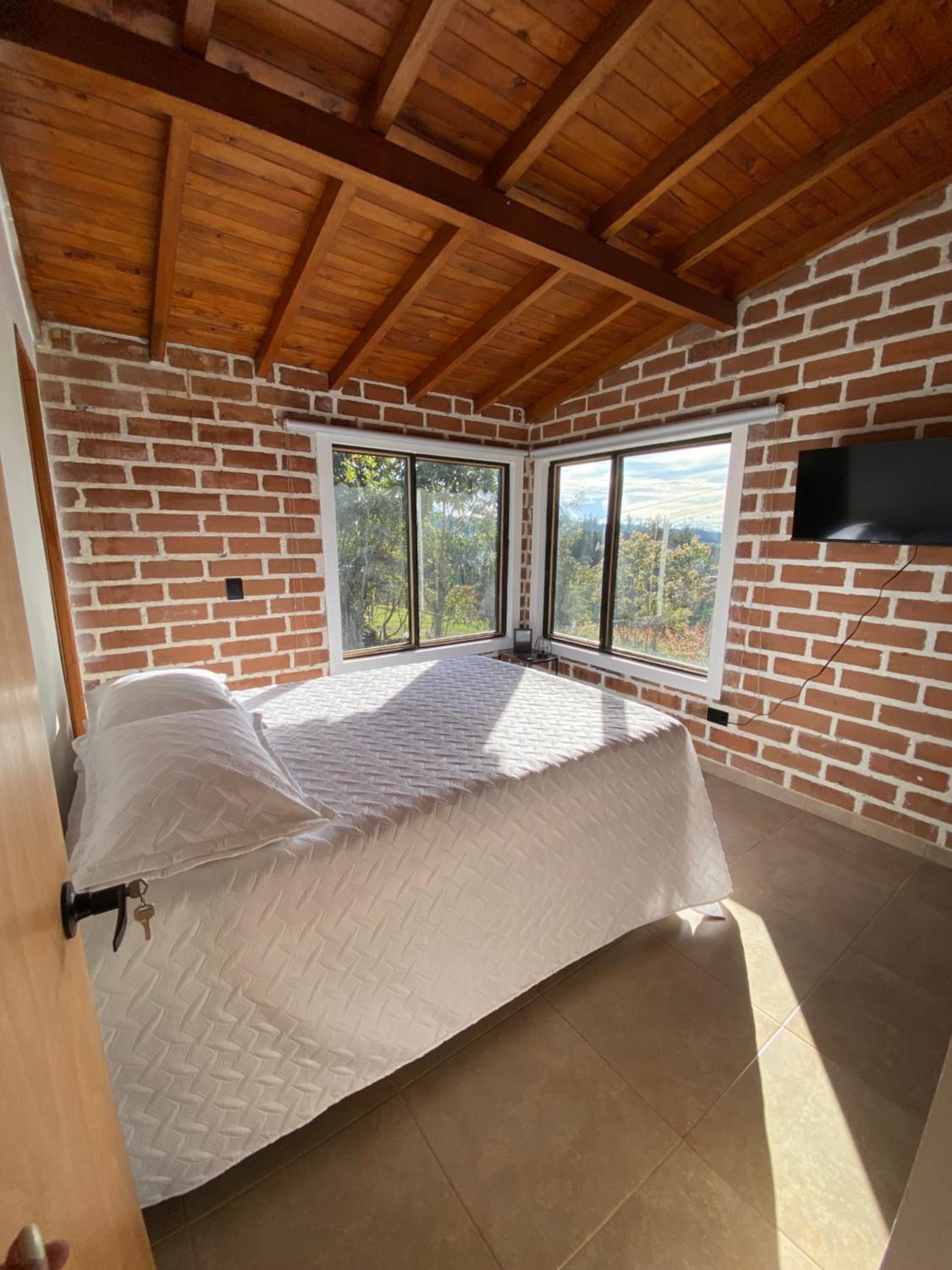 Habitación con baño privado en casa de campo ubicada en Santa Elena