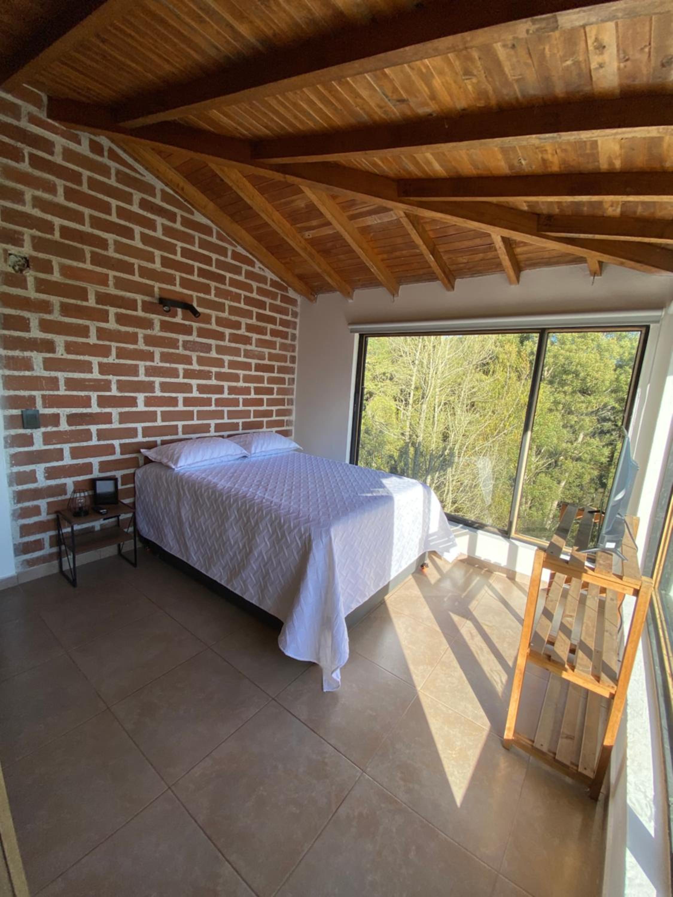 Habitación con baño privado en casa de campo ubicada en Santa Elena