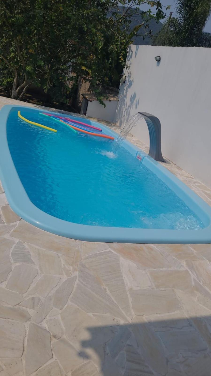 Casa com piscina e churrasqueira!