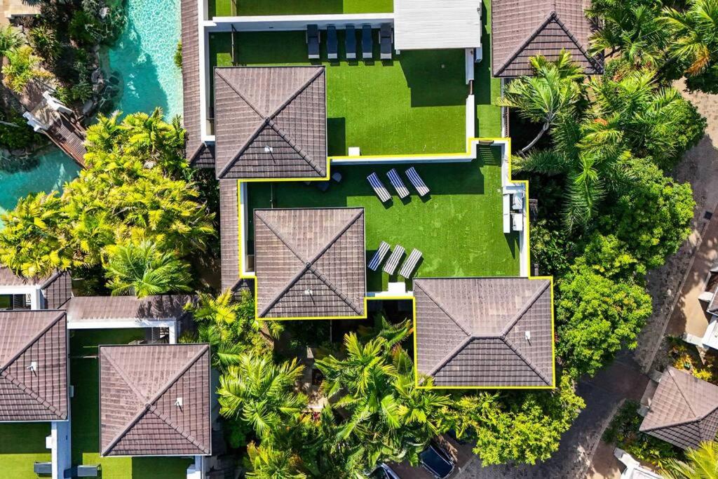 Luxury Port Douglas beachside 3 Bedroom Temple Apartment with Private roof top terrace Due to copyright we can't disclose the resort name but google Port D