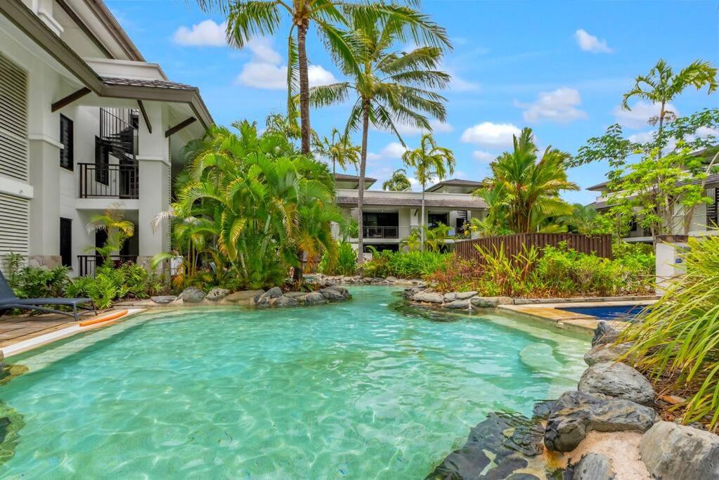 Luxury Port Douglas beachside 3 Bedroom Temple Apartment with Private roof top terrace Due to copyright we can't disclose the resort name but google Port D