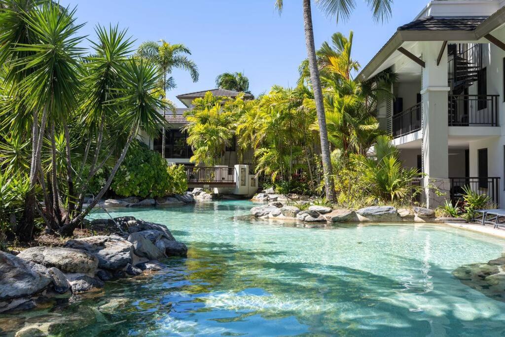Luxury Port Douglas beachside 3 Bedroom Temple Apartment with Private roof top terrace Due to copyright we can't disclose the resort name but google Port D
