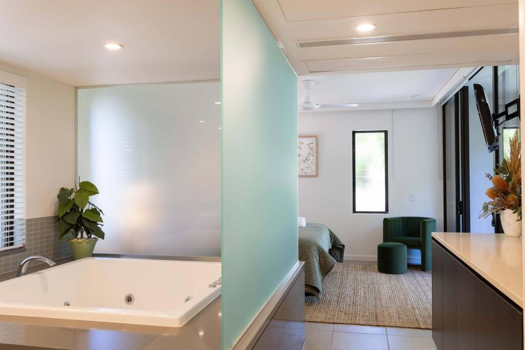 Luxury Port Douglas beachside 3 Bedroom Temple Apartment with Private roof top terrace Due to copyright we can't disclose the resort name but google Port D