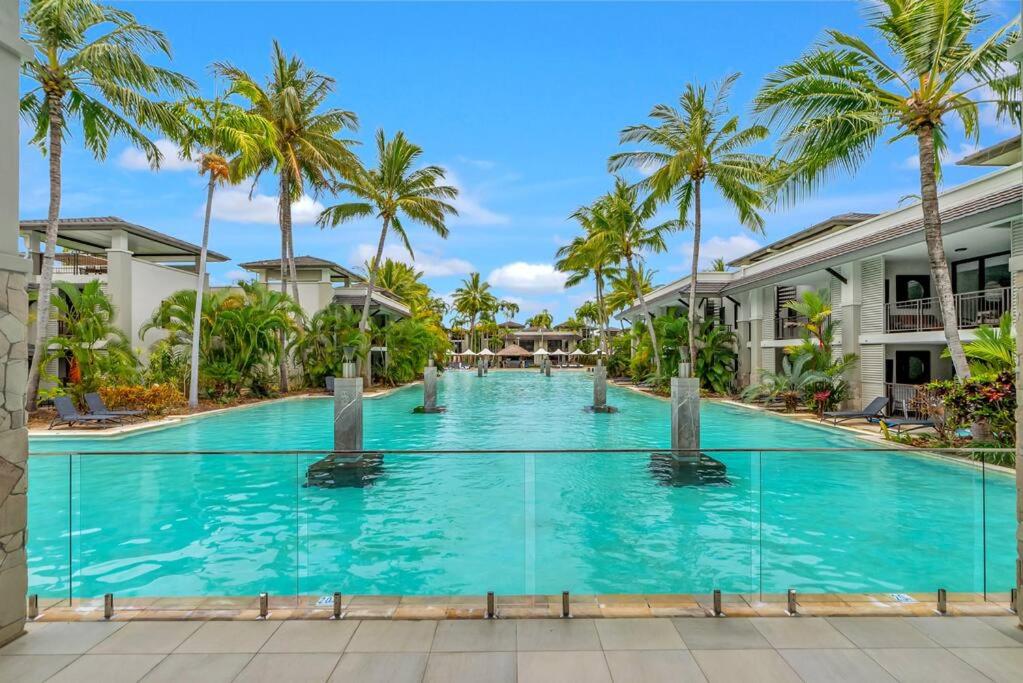 Luxury Port Douglas beachside 3 Bedroom Temple Apartment with Private roof top terrace Due to copyright we can't disclose the resort name but google Port D