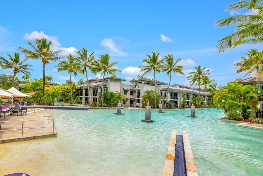 Luxury Port Douglas beachside 3 Bedroom Temple Apartment with Private roof top terrace Due to copyright we can't disclose the resort name but google Port D
