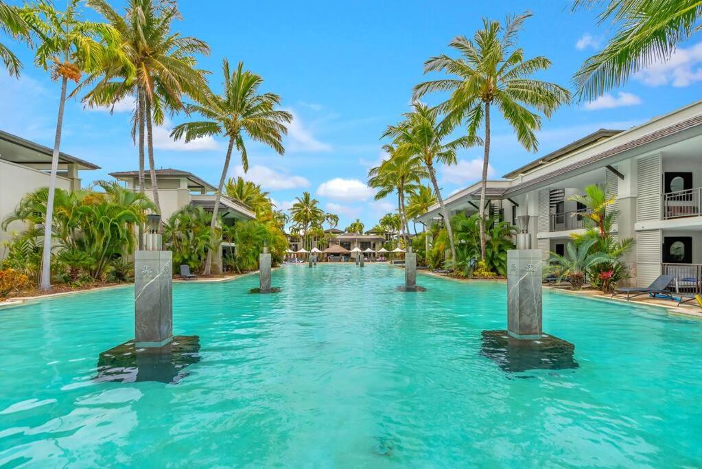 Luxury Port Douglas beachside 3 Bedroom Temple Apartment with Private roof top terrace Due to copyright we can't disclose the resort name but google Port D