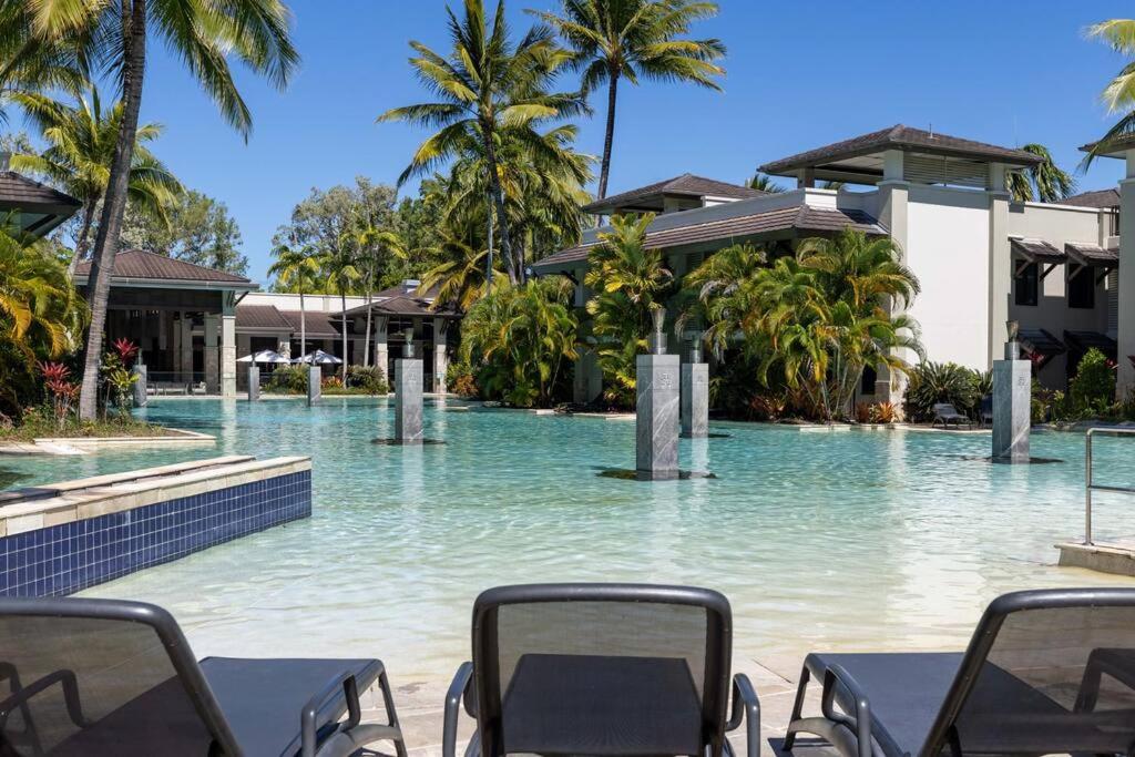 Luxury Port Douglas beachside 3 Bedroom Temple Apartment with Private roof top terrace Due to copyright we can't disclose the resort name but google Port D