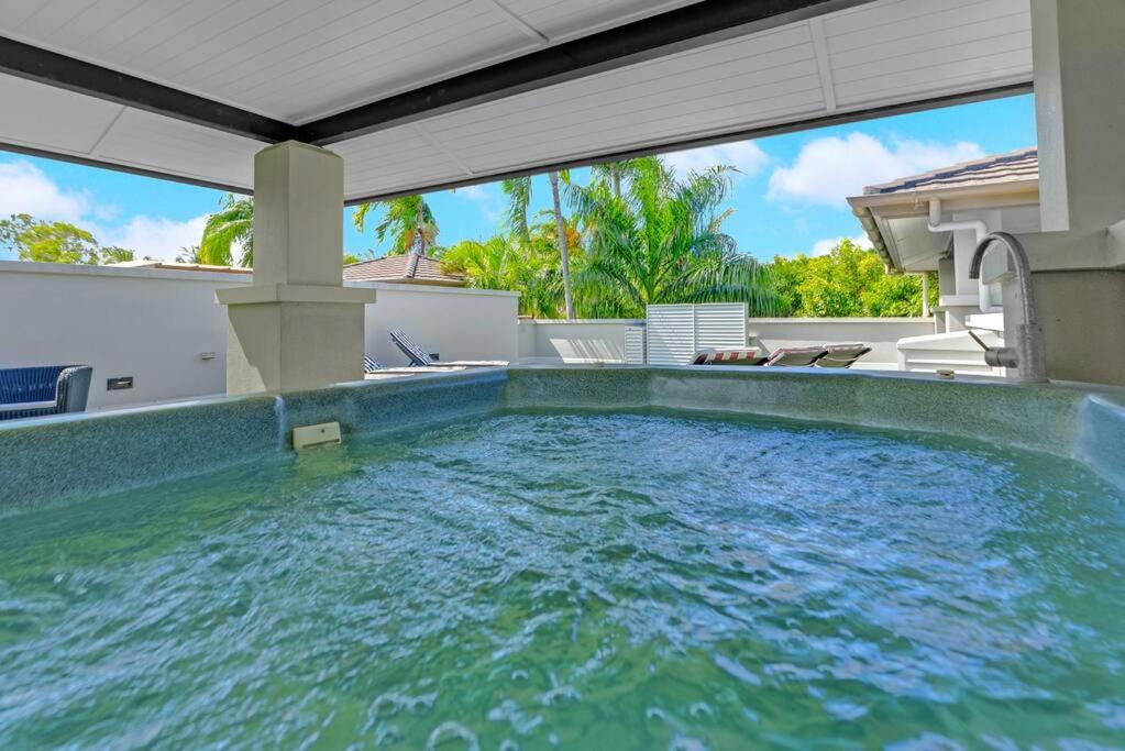 Luxury Port Douglas beachside 3 Bedroom Temple Apartment with Private roof top terrace Due to copyright we can't disclose the resort name but google Port D