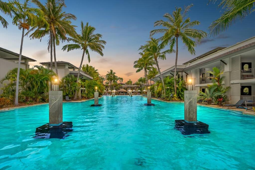 Luxury Port Douglas beachside 3 Bedroom Temple Apartment with Private roof top terrace Due to copyright we can't disclose the resort name but google Port D
