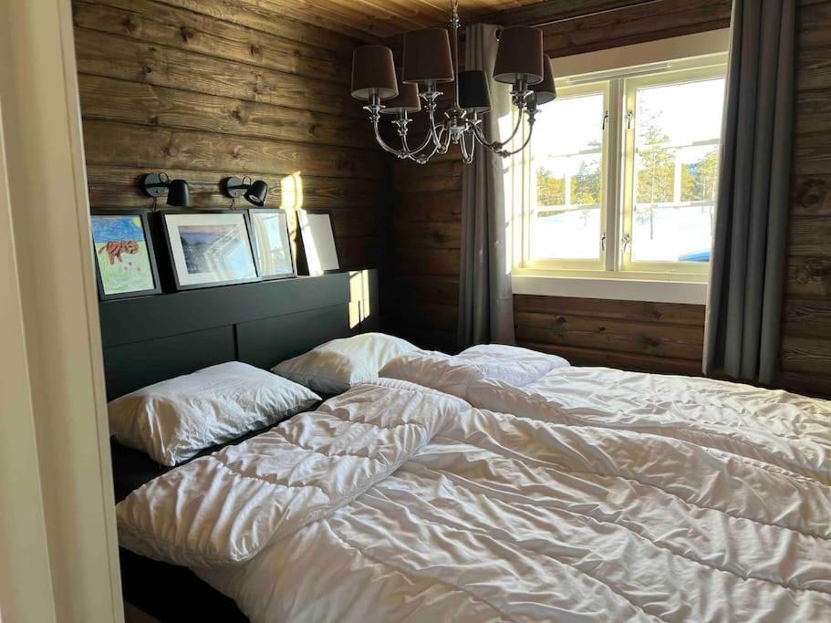 Delikat tømmerhytte på Blefjell