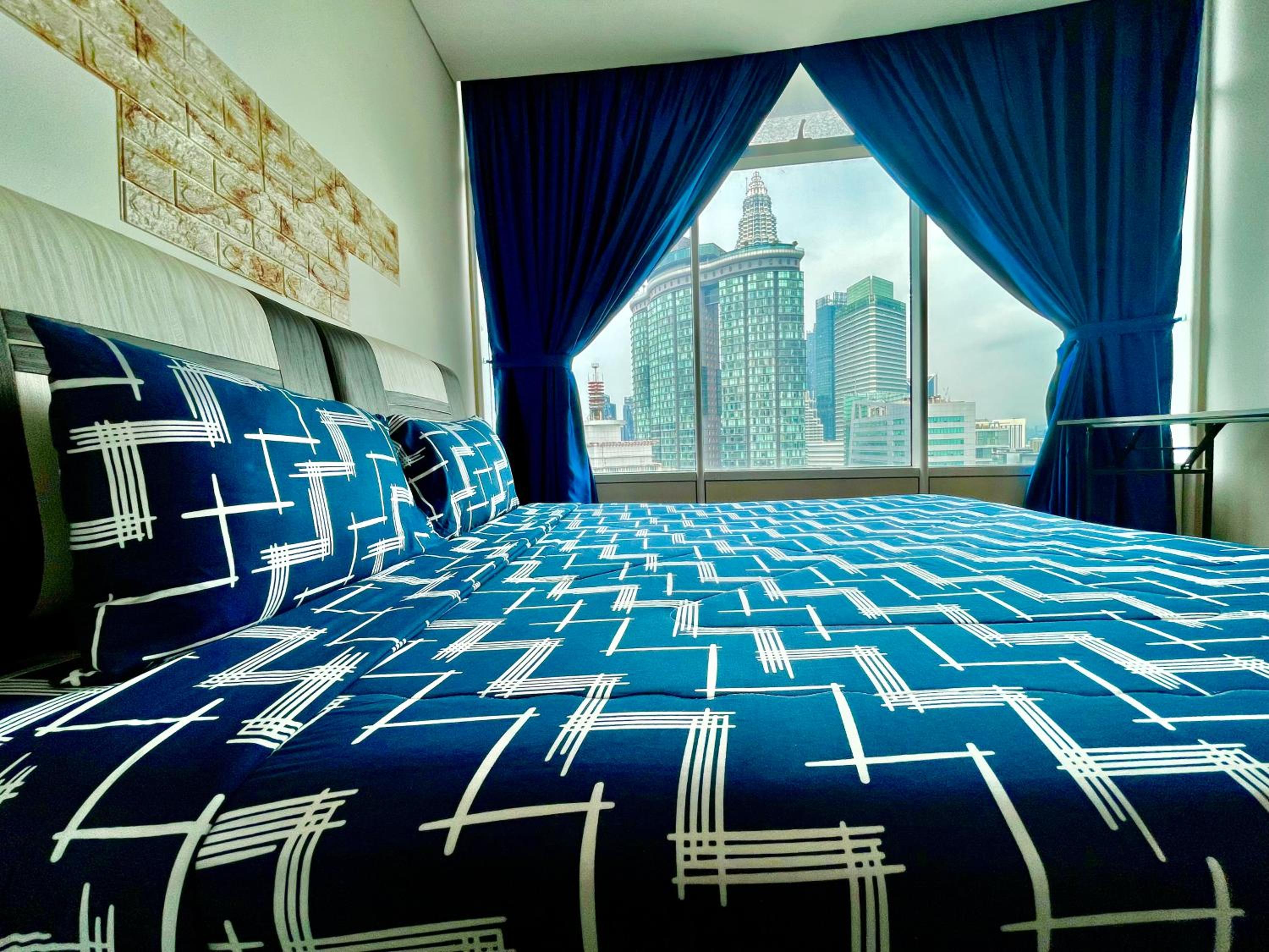 vortex suites klcc by Raf