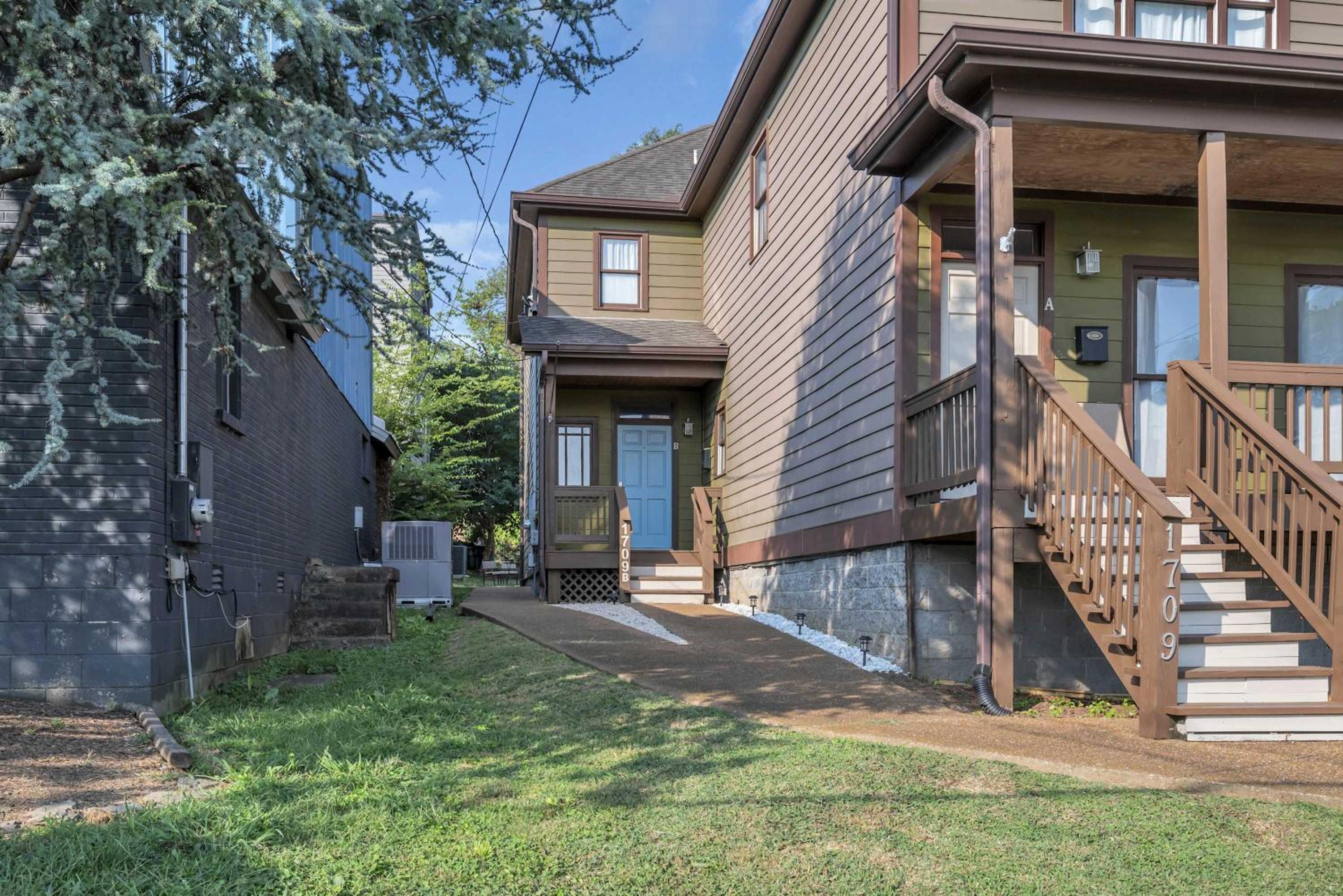 Stylish Home Near Downtown with 3 Bedrooms & 3 Baths, Walk to Nashville Best Dining & Coffee Shops, Private Yard with Grill, Smart TVs in Every Room, Drive view 2