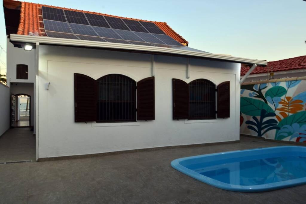 Casa pé na areia