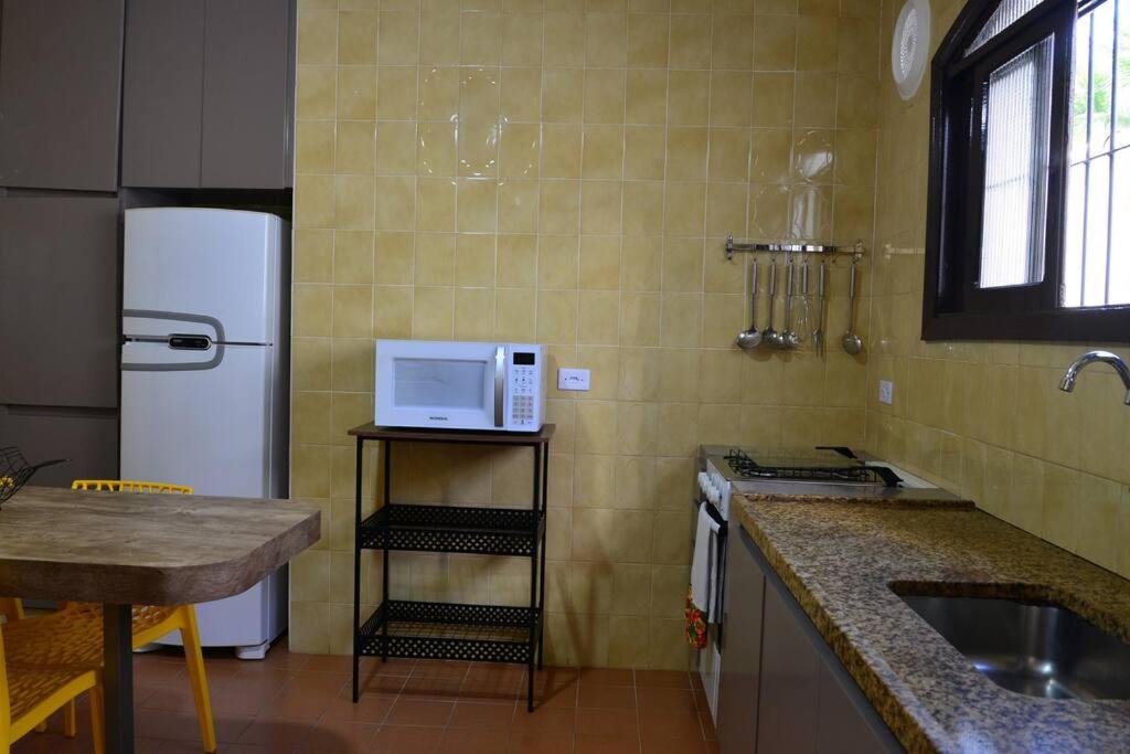 Casa pé na areia