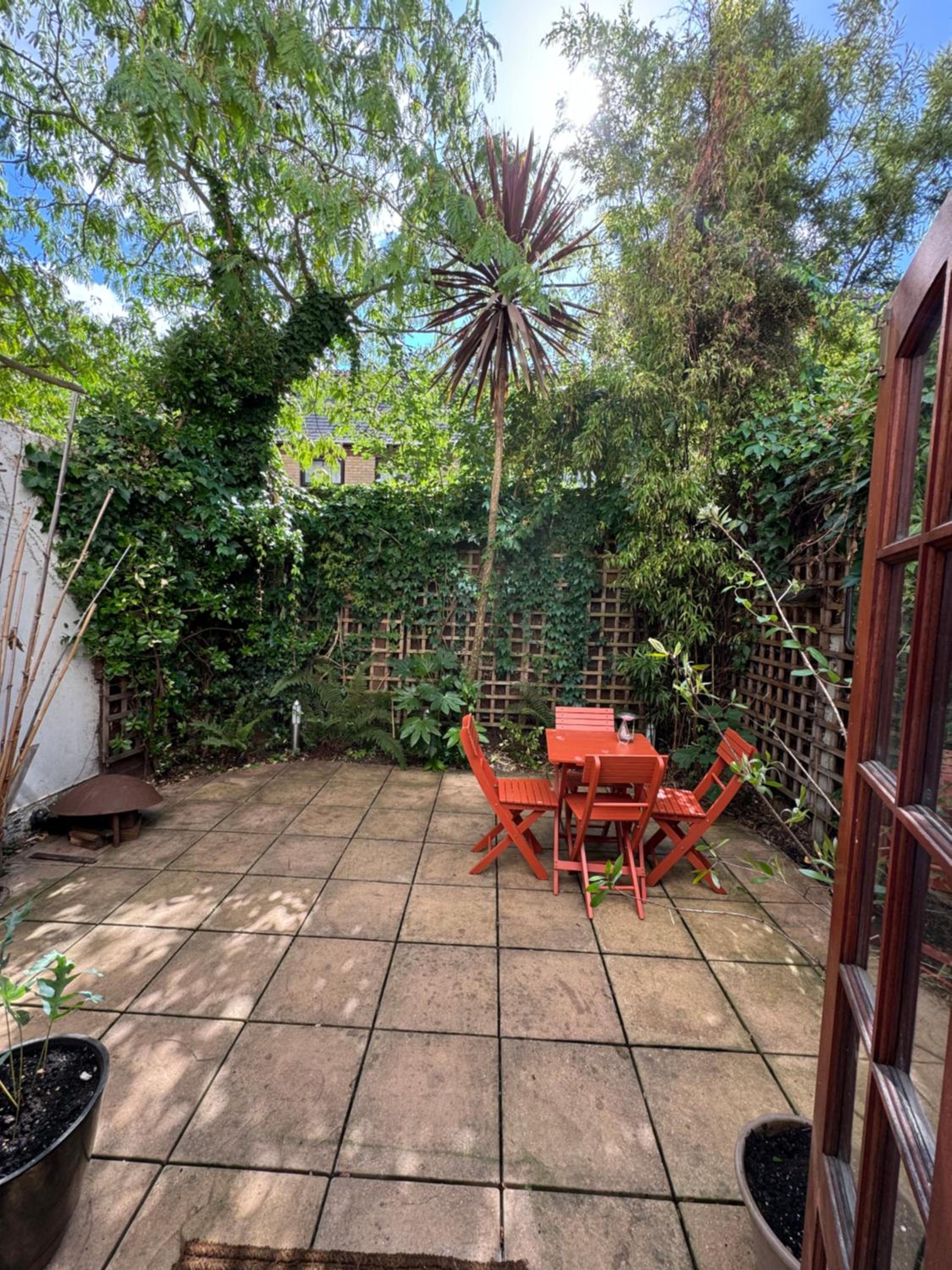 A beautiful room with a private garden