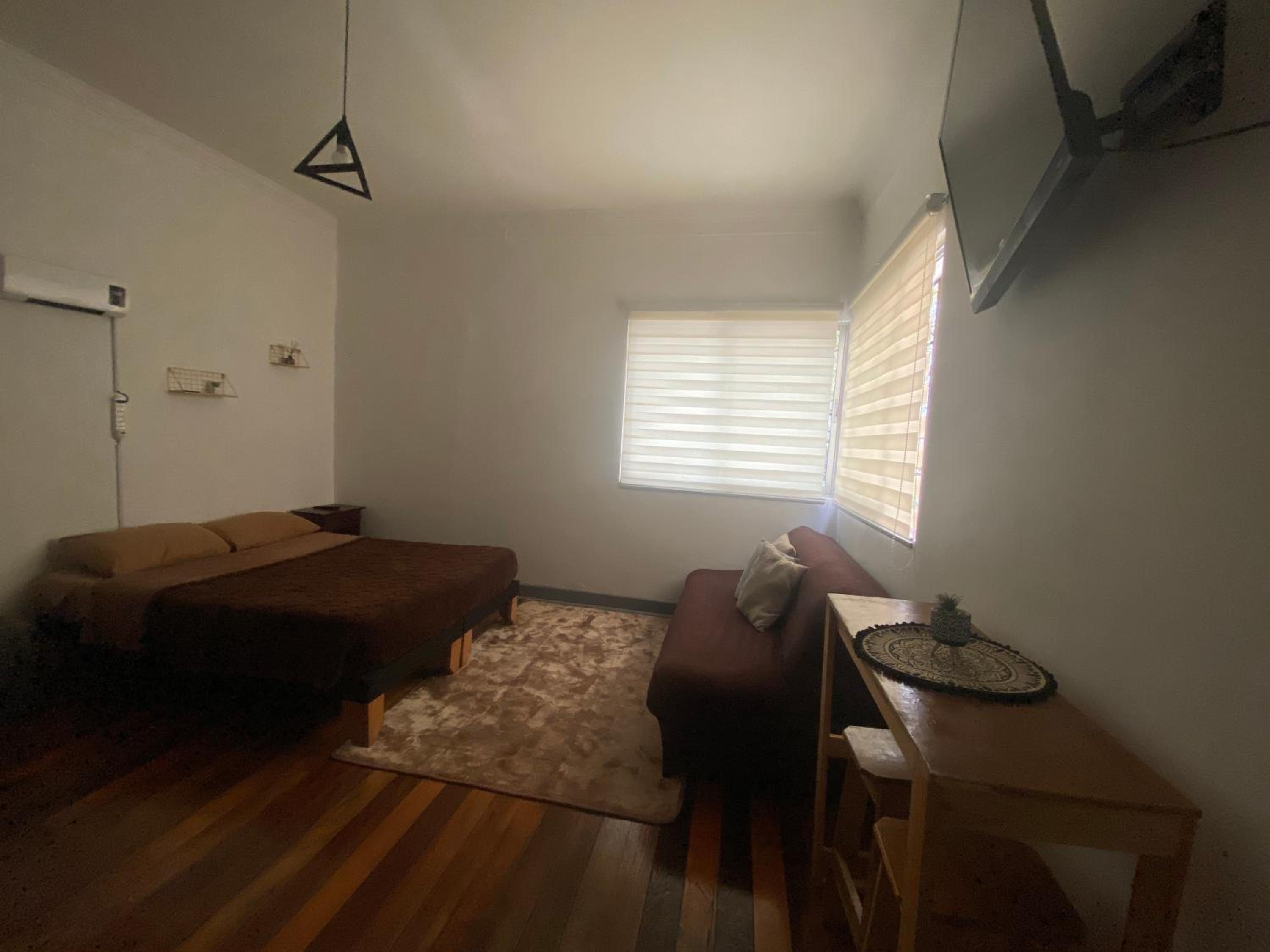 CASA ROMÁN Habitación en Providencia con áreas compartidas