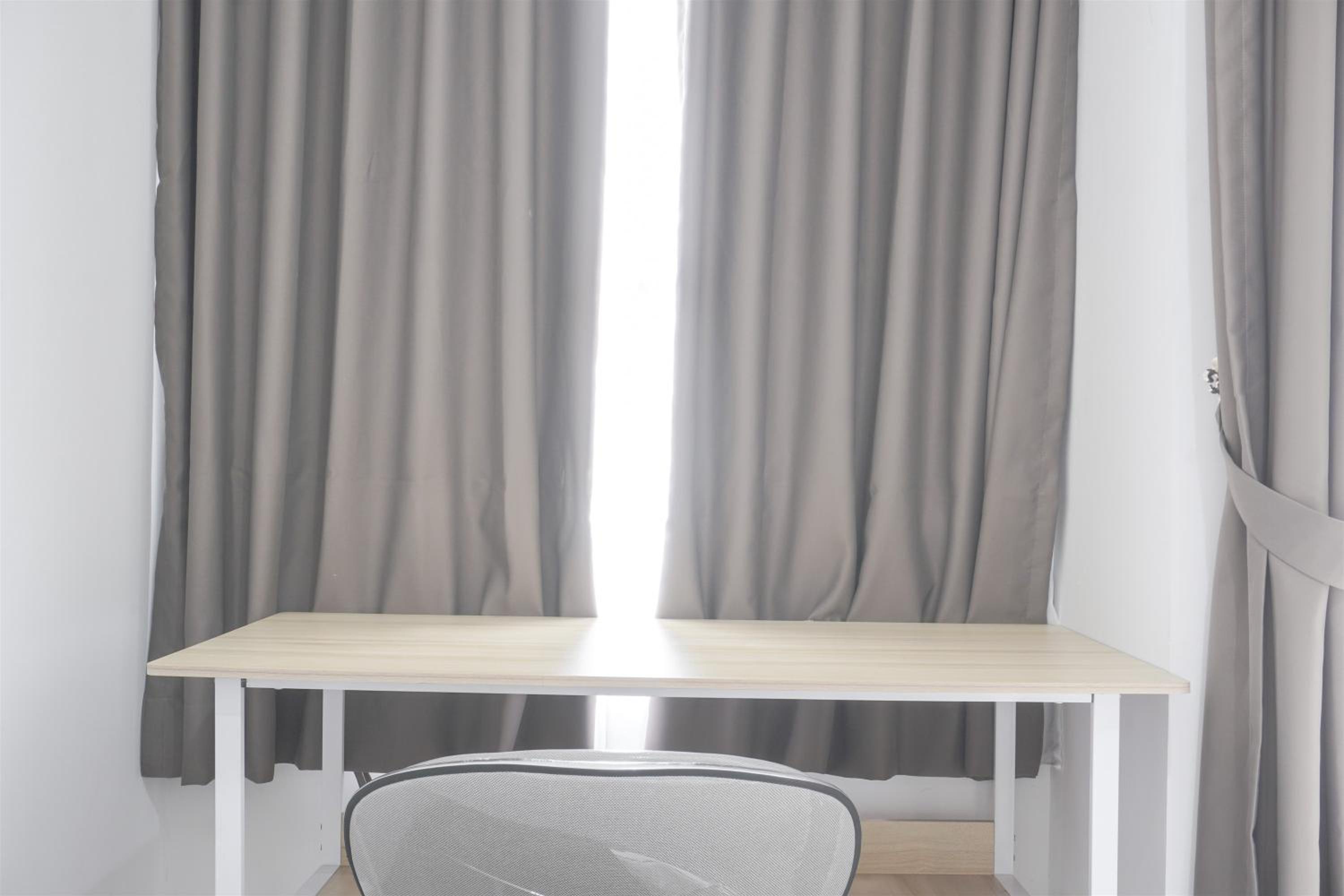 Modern Look Studio Room at Citra Living Apartment By Travelio view 3