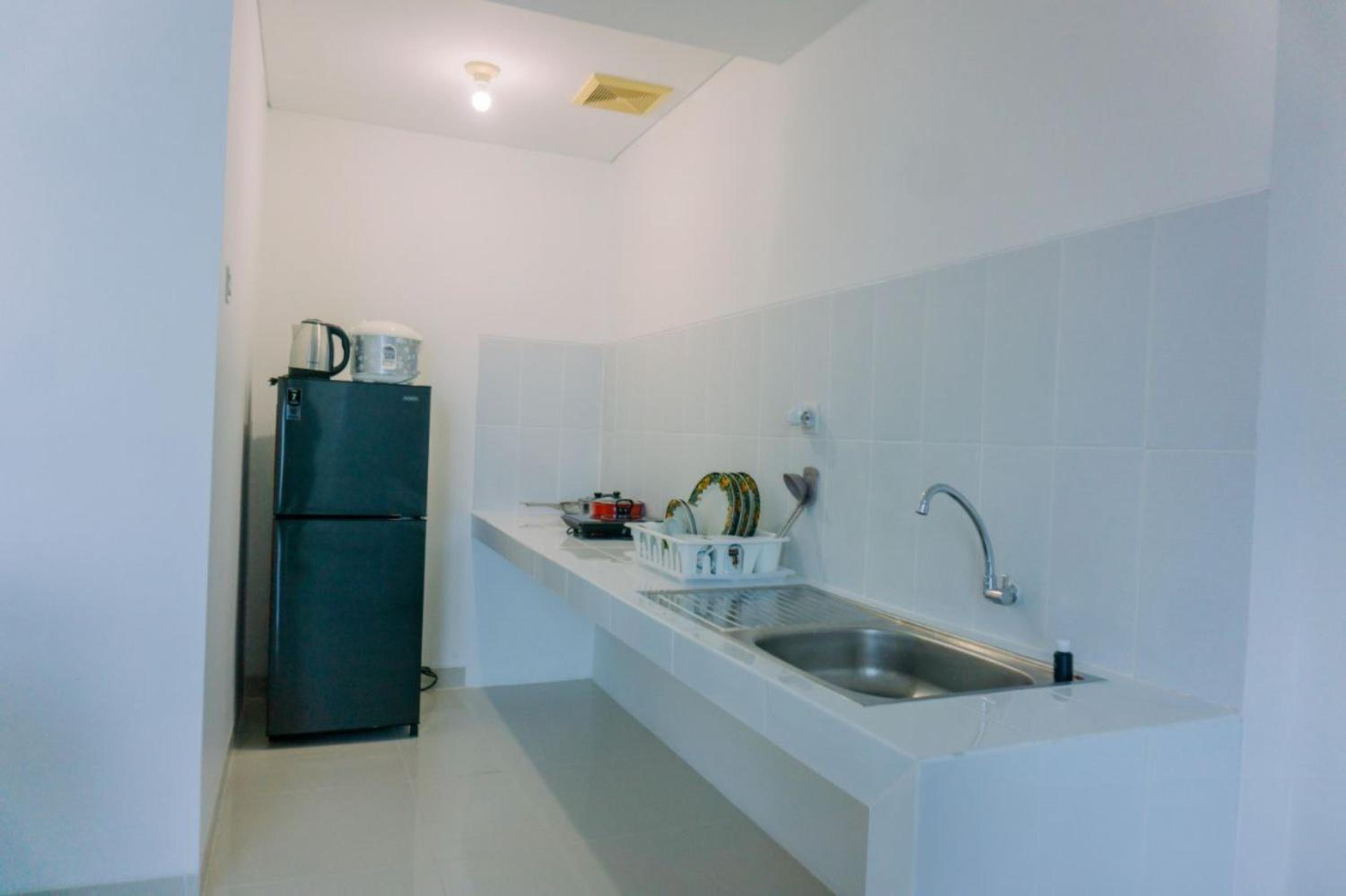 Modern Look and Spacious 1BR at Neo Soho Apartment By Travelio