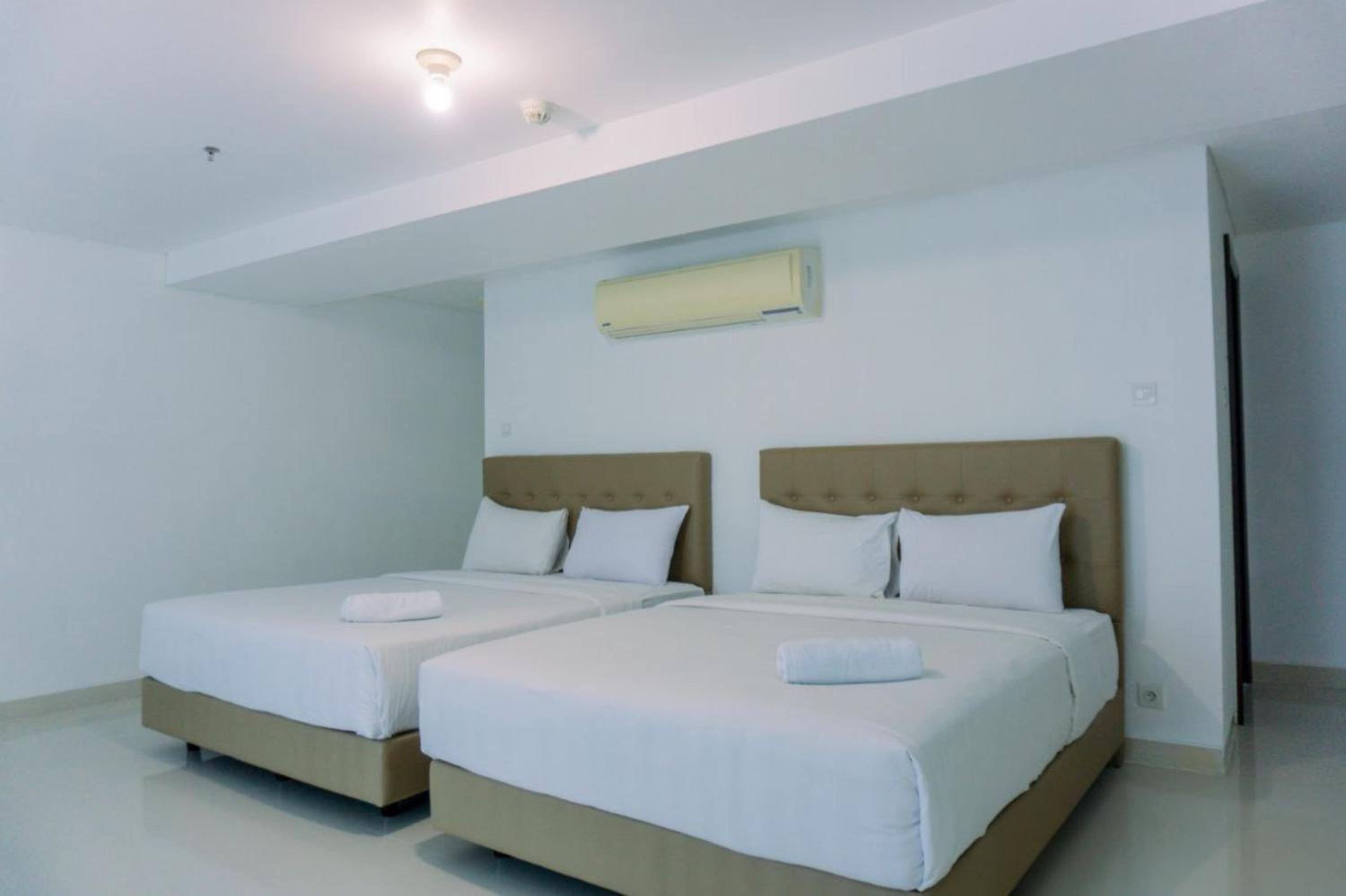 Modern Look and Spacious 1BR at Neo Soho Apartment By Travelio