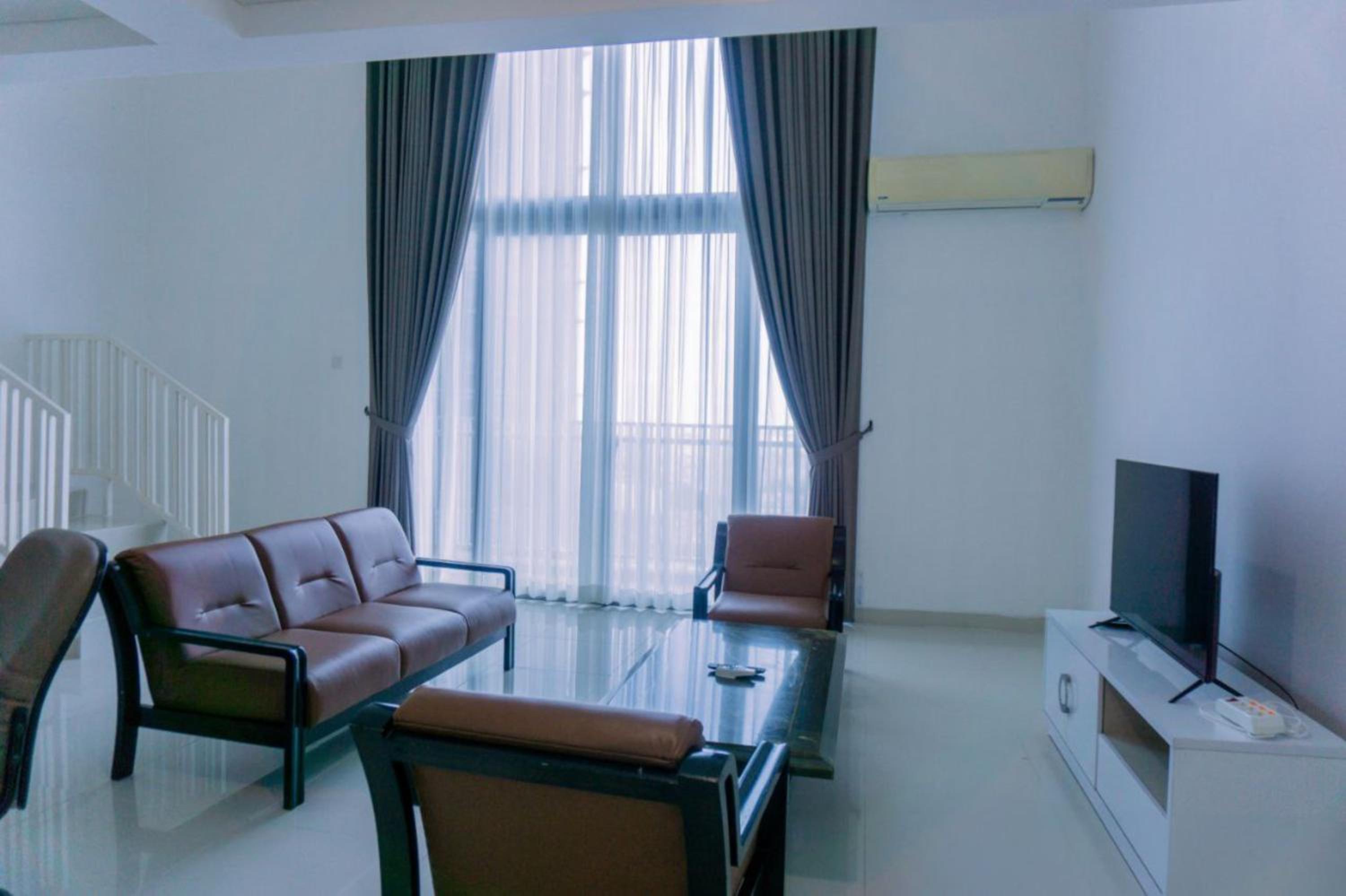 Modern Look and Spacious 1BR at Neo Soho Apartment By Travelio