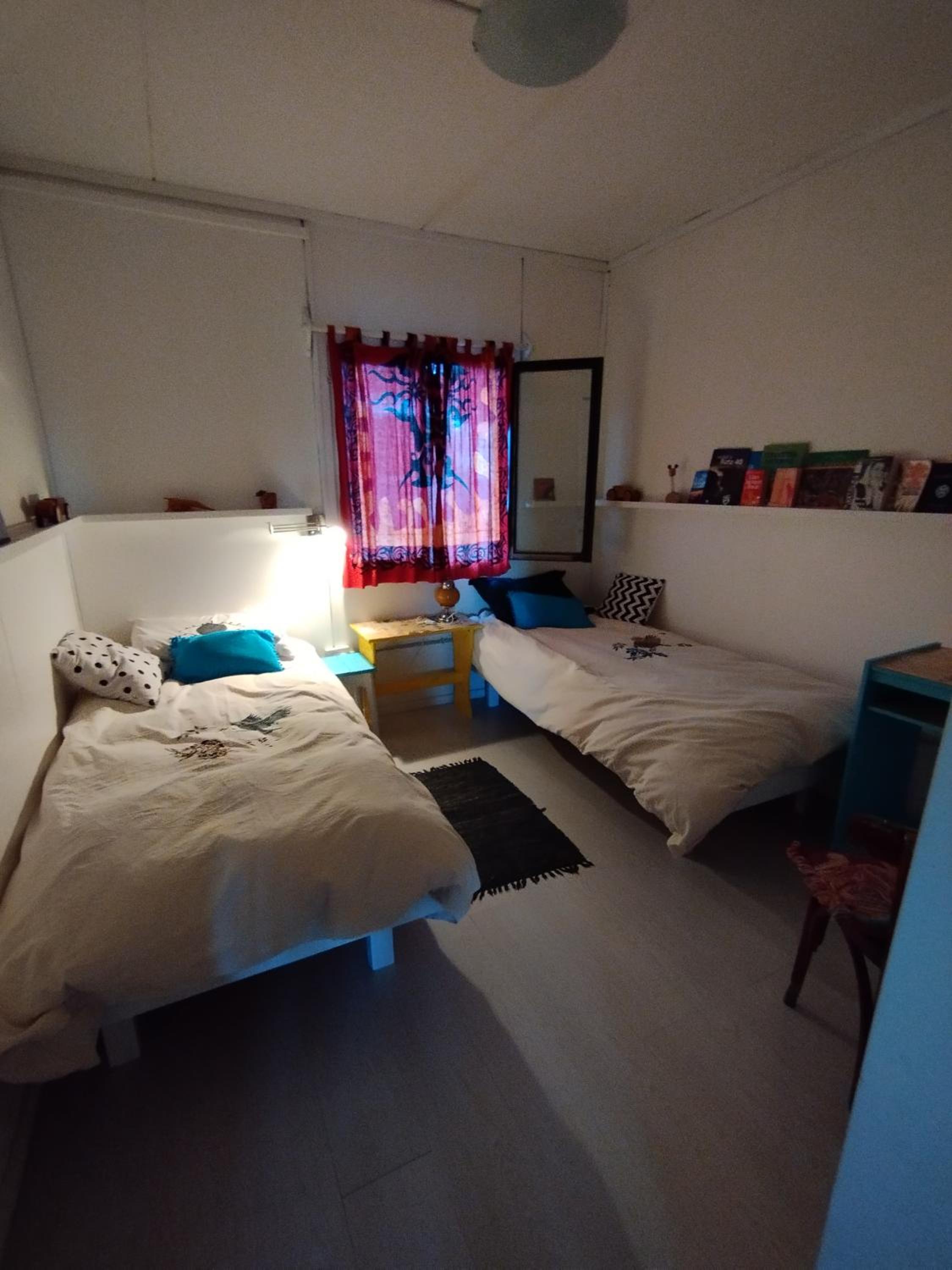 Casa Gorrión escarlata