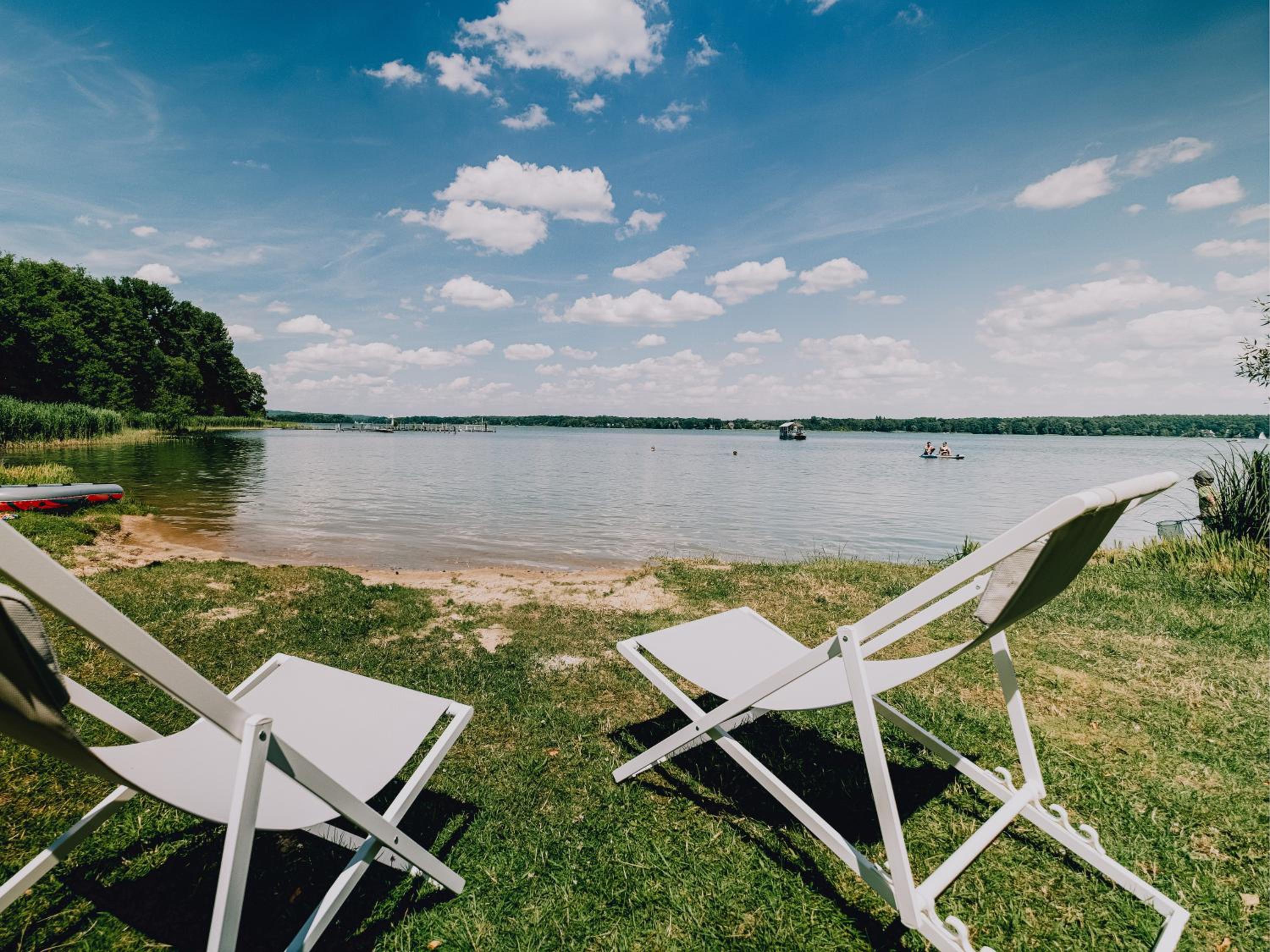 TheChipp - Designapartment mit Seeblick, Pool, Sauna & Kamin