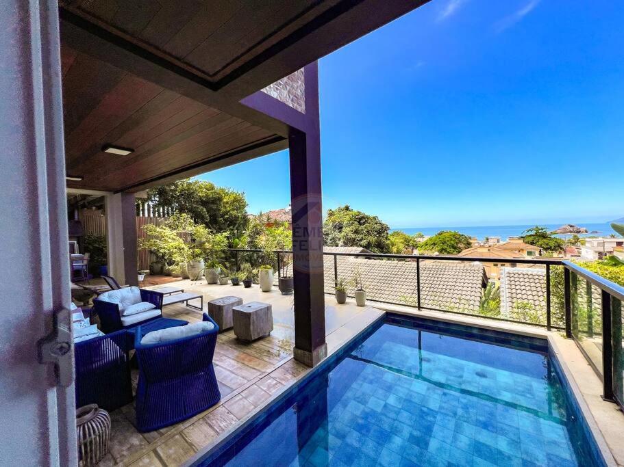 Casa com vista para o mar em Juquehy com 4 suítes, piscina privativa e sauna, 80 mts da praia