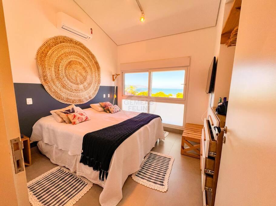 Casa com vista para o mar em Juquehy com 4 suítes, piscina privativa e sauna, 80 mts da praia
