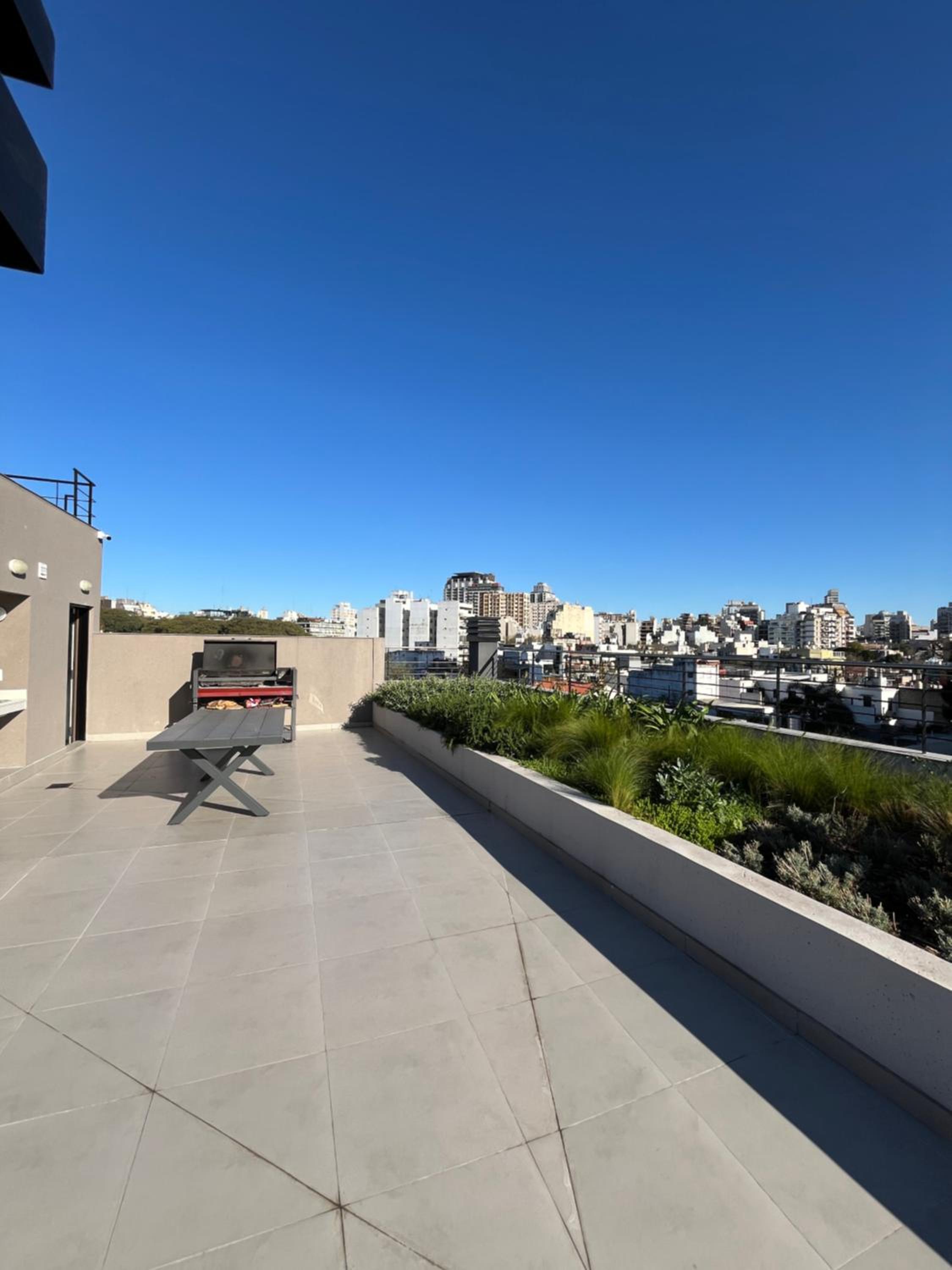 Moderno estudio con terraza y parrilla en Palermo