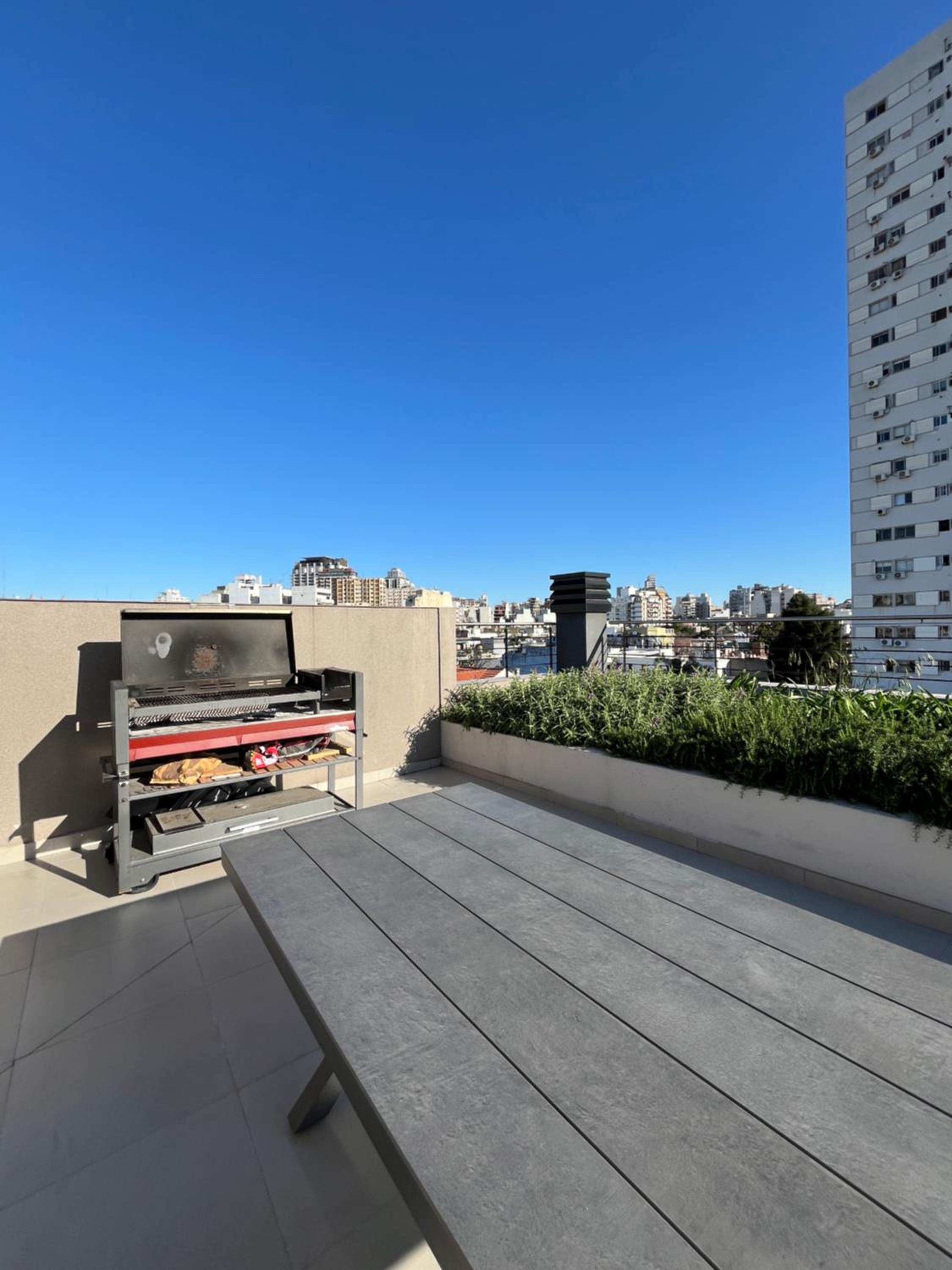Moderno estudio con terraza y parrilla en Palermo