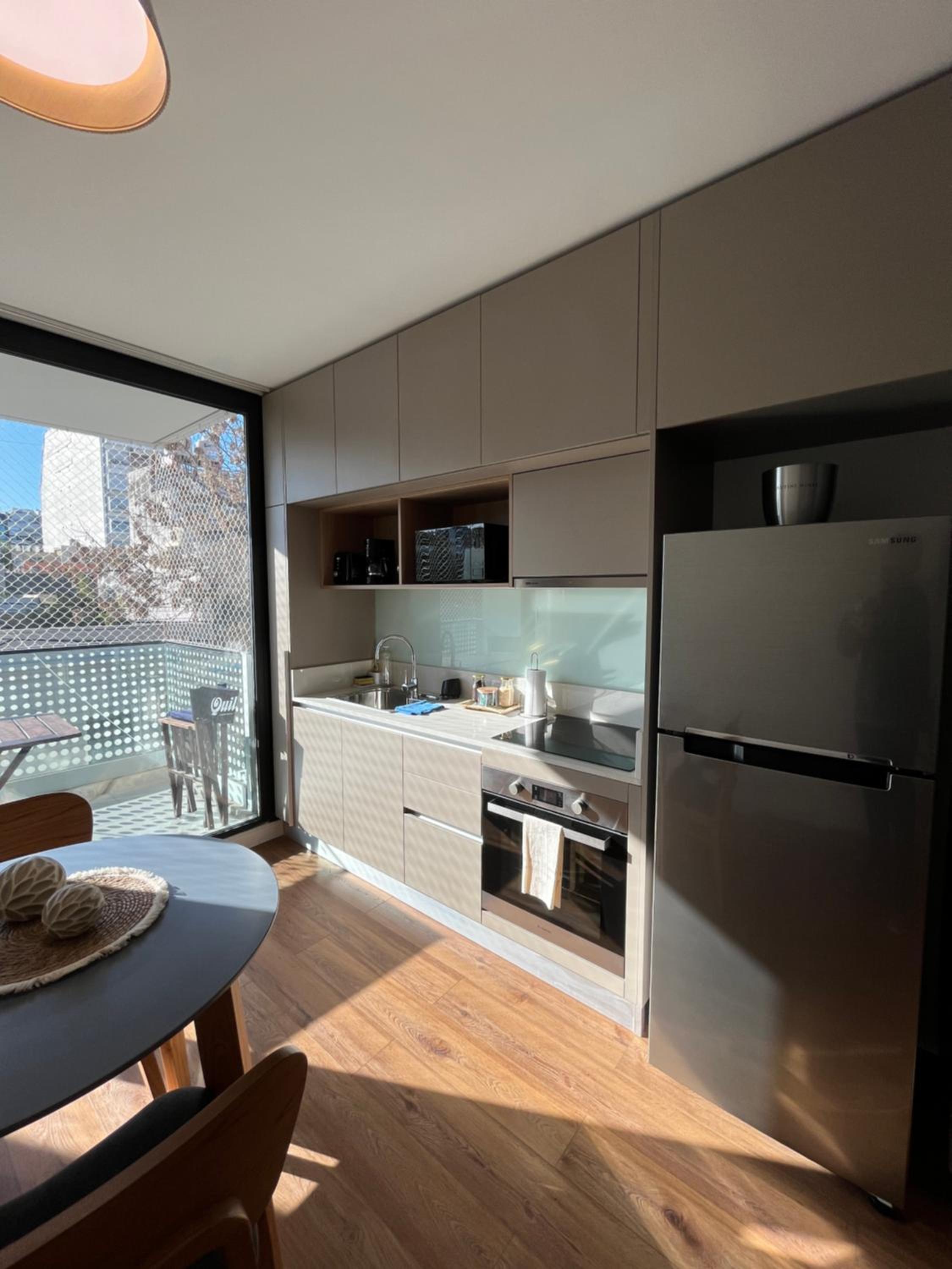 Moderno estudio con terraza y parrilla en Palermo